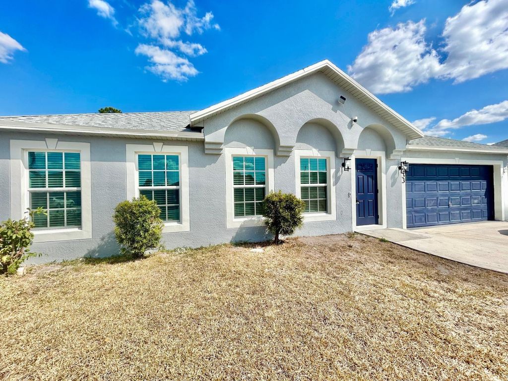 Photo of 3933 SW Kakopo St, Port Saint Lucie, FL 34953 (MLS # F10552549)