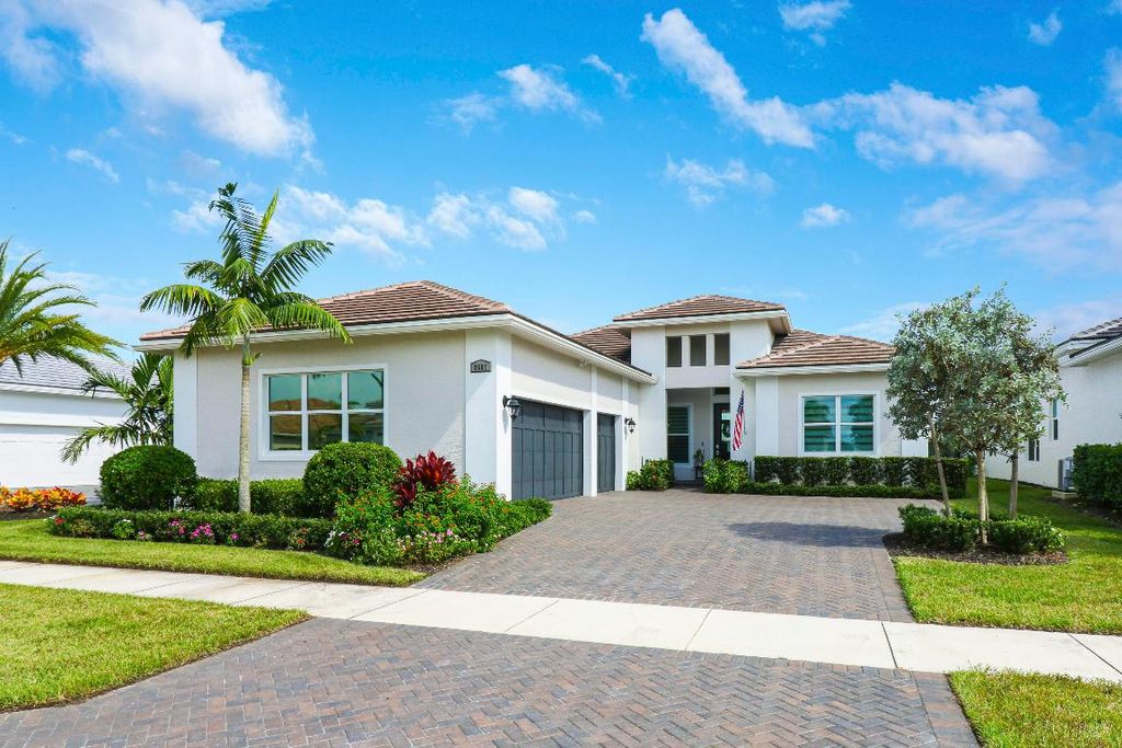 Photo of 8687 SW Flutto Way, Port Saint Lucie, FL 34987 (MLS # R10926813)
