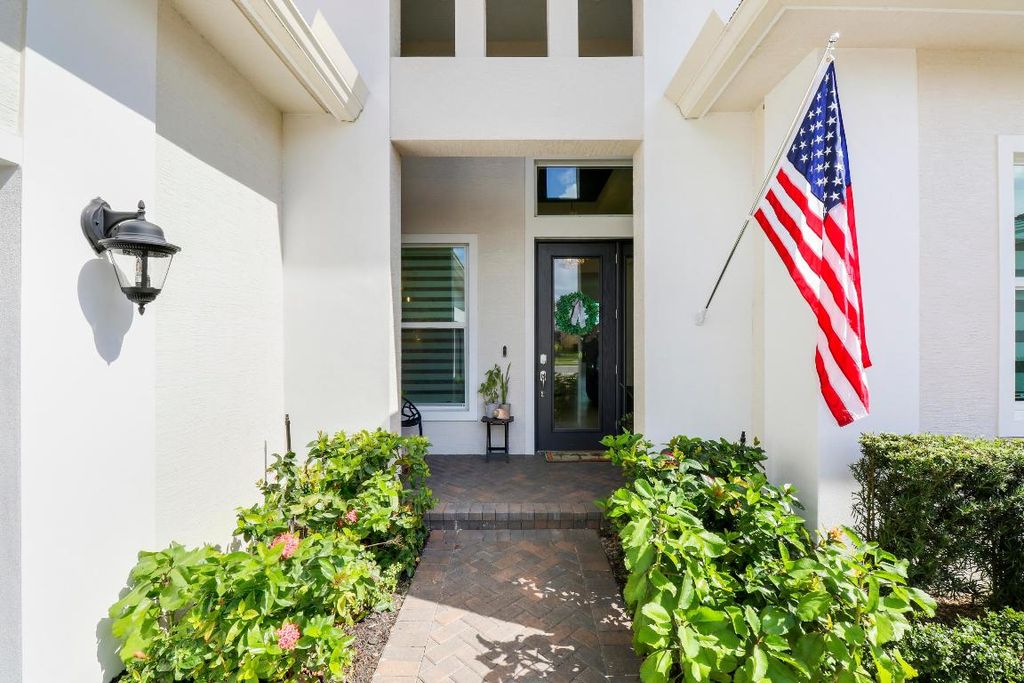 Photo of 8687 SW Flutto Way, Port Saint Lucie, FL 34987 (MLS # R10926813)