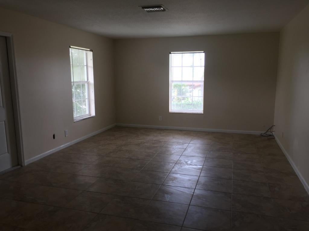 Photo of 4931 Wedgewood Way #8, West Palm Beach, FL 33417 (MLS # R11088941)