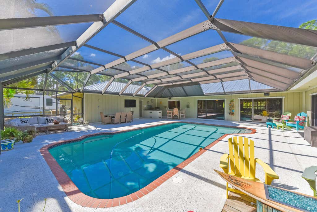 Photo of 4421 SW Laurel Oak Terrace, Palm City, FL 34990 (MLS # R10950044)