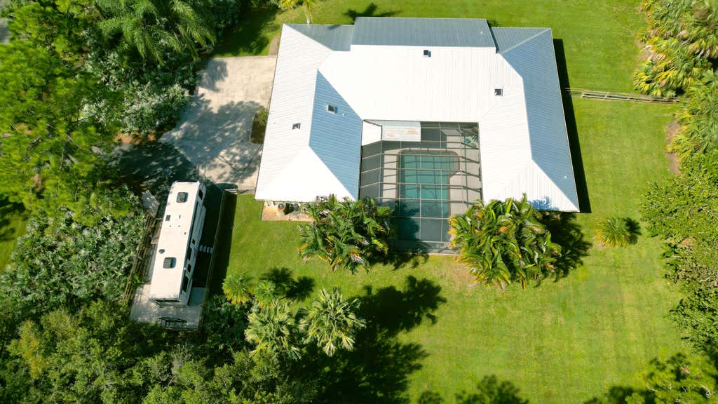 Photo of 4421 SW Laurel Oak Terrace, Palm City, FL 34990 (MLS # R10950044)