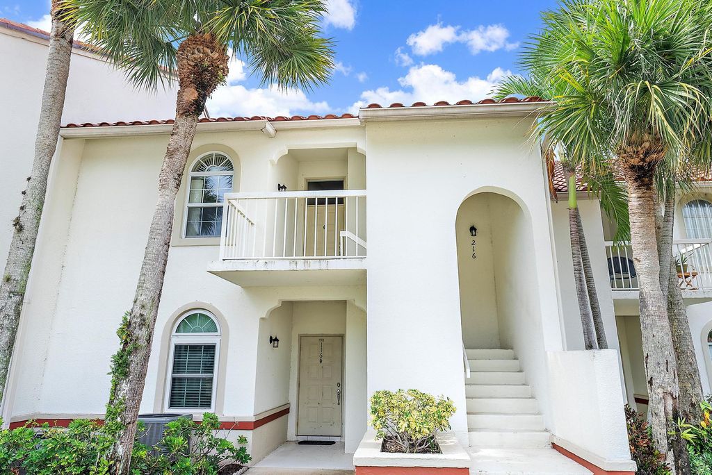 Photo of 216 Cypress Point Drive, Palm Beach Gardens, FL 33418 (MLS # R10990865)