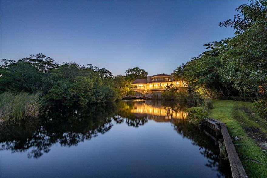 2.5 acre waterfront estate in High Point, Sewalls Point, FL. Nestled on a barrier island between St Lucie & Indian River Lagoon, this 3story CBS home offers soaring ceilings, natural light, w/beautiful views. 4 bdrm, 5.5 baths, den, spa room w/sauna, elevator that goes to rooftop terrace. Private 3rd floor master suite w/sitting area, wet bar, his/her cedar closets, spa bath w/steam shower jacuzzi & bidet. Tropical oasis pool w/slide, hot tub, outdoor bar, pond, dock w/boat lift 35 ft boat & room for jet skis. Designed for luxury living & grand entertaining. This one-of-a-kind estate is perfect for a buyer with a vision to create their own luxury private sanctuary.