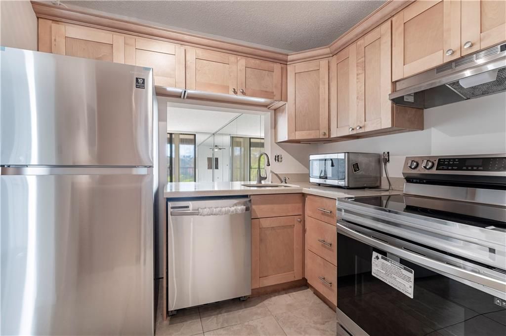 Photo of 3000 NW 42nd Ave #B305, Coconut Creek, FL 33066 (MLS # F10311622)