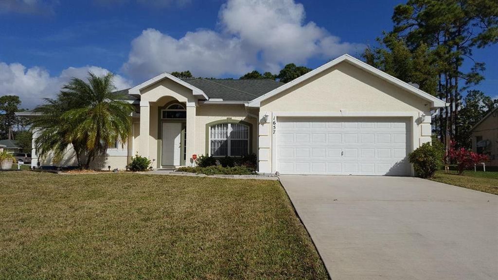 Photo of 1657 SW Mercedes Avenue, Port Saint Lucie, FL 34953 (MLS # R10712275)