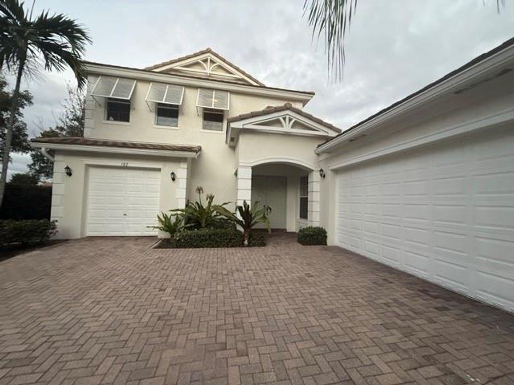 Photo of 182 Palm Beach Plantation Blvd, Royal Palm Beach, FL 33411 (MLS # F10541558)