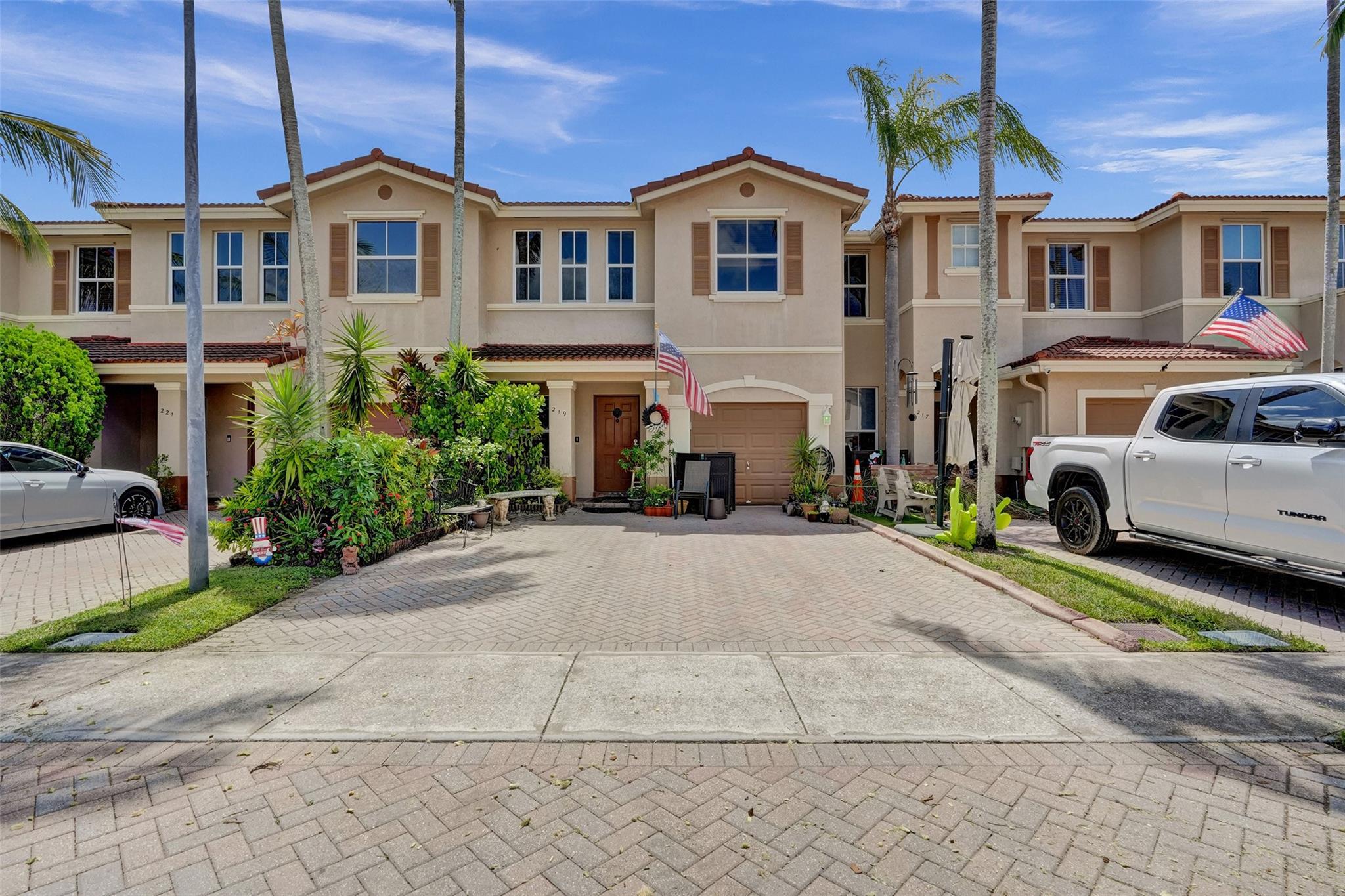 Rarely available 2 bedroom 2 1/2 bath townhome with garage. This unit has more square footage than most 2 bedroom units. Great location. Enjoy everything Weston has to offer with the taxes of Sunrise. Nice open kitchen with snack counter. Newer stainless steel appliances. Two master bedrooms both with walk in closets. Each have large bathrooms with their own tubs. Living room plus family room. 4 ceiling fans. New hot water heater. Large private fenced back yard. Plenty of space for children and pets to play. Extended patio with pavers. Great for entertaining, barbecues and outdoor living. One car garage with double car driveway. Community pool and playground. Close to parks, recreation, restaurants and entertainment. Easy access to all major highways. Hurry on this one! Will not last!