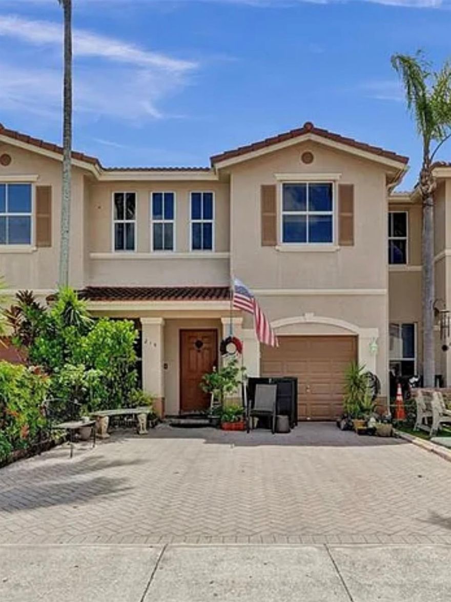 Priced to make it your own! Original owner is relocating. Rarely available 2/2/1 with garage and back yard! This unit has more square footage than most 2 bedroom units. Great safe location. Enjoy everything Weston has to offer with the taxes of Sunrise. Nice open kitchen with snack counter. Newer stainless steel appliances. Two master bedrooms both with walk in closets. Each have large bathrooms with their own tubs. Living room plus family room. 4 ceiling fans. New hot water heater. Large private fenced back yard. Plenty of space for children and pets to play. Extended patio with pavers. Great for entertaining, barbecues and outdoor living. One car garage with double car driveway. Community pool and playground. Close to parks, recreation, restaurants and entertainment.