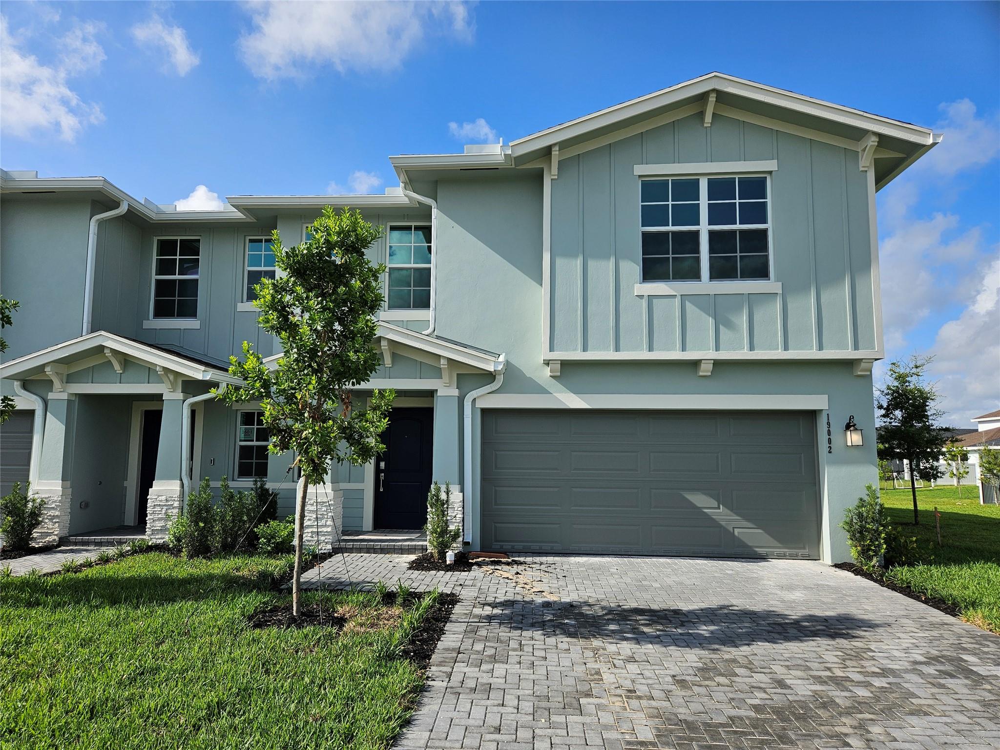 New Construction! This stunning two-story twin home offers an open-concept design on the first floor, featuring a spacious Great Room, a fully equipped kitchen with quartz countertops, all-new stainless steel appliances, including a gas range with a griddle and a built-in microwave, and a lovely dining area. A covered lanai at the rear provides the perfect space for outdoor activities. Upstairs, a cozy loft is surrounded by 2 secondary bedrooms, one junior suite and owner's suite with custon Closets. Two-car garage with epoxy floor. Arden amenities include community lake house with wifi cafe bar, screened patio with fireplace, tennis, playground, 20 miles of walking trails , 2 resort style pools and so much more. Arden community is zoned for A+ school. Arden summer programs for kids.