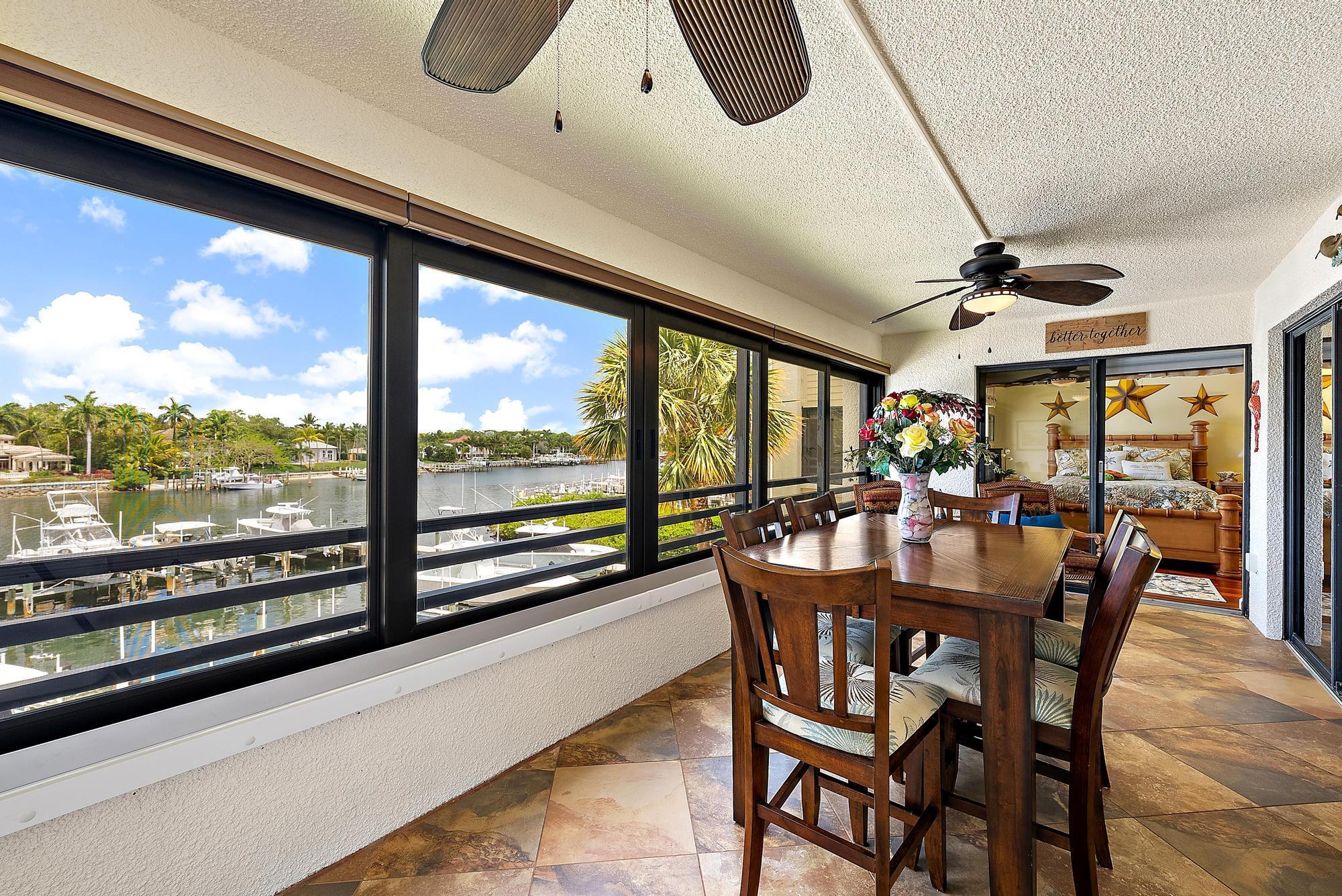 Come watch the boats glide by from this stunning intracoastal-front 2 BR, 2 1/2 BA condo. Enjoy sweeping water views from the spacious wraparound balcony and nearly every room. Thoughtfully furnished and fully equipped, including a split king adjustable bed, this home offers comfort and style. Oak Harbour's gated community features a waterfront clubhouse with fitness center and billiards, two heated pools, tennis, and a vibrant social calendar. Just minutes to pristine beaches, fine dining, and shopping and only 25 minutes to PBI Airport. FYI, the association doesn't permit pick-ups.