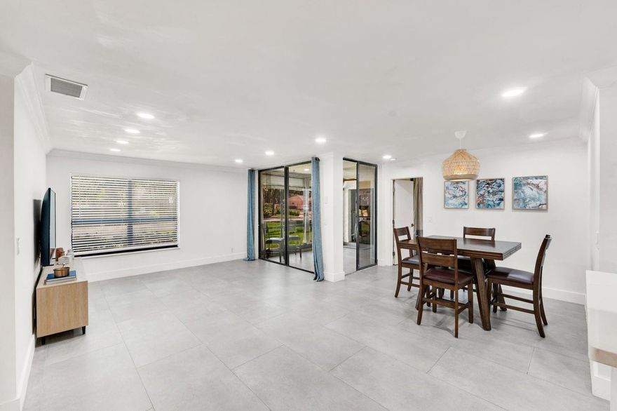 Welcome Home.... Freshly painted ready to Move in! 3 bed, 2 bath corner unit in Coconut Creek’s Karanda Village at The Township. Renovated with sleek porcelain tile floors, contemporary kitchen with quartz counters, new stainless steel appliances. Bathrooms feature designer finishes with all new plumbing completed during renovation. The owner’s suite boasts a custom closet. Private patio includes outdoor sink, storage, and full-size washer & dryer. Assigned parking included. Enjoy Florida living with Township amenities: multiple pools, tennis courts, clubhouse, playgrounds, gym & more. Next to a large lake—perfect for fishing & relaxing. Close to the Promenade at Coconut Creek, shopping, dining & parks. Move-in ready—offering a lifestyle for all ages! Immaculate & tastefully updated Freshly painted ready to Move in! 3 bed, 2 bath corner unit in Coconut Creek’s Karanda Village at The Township.