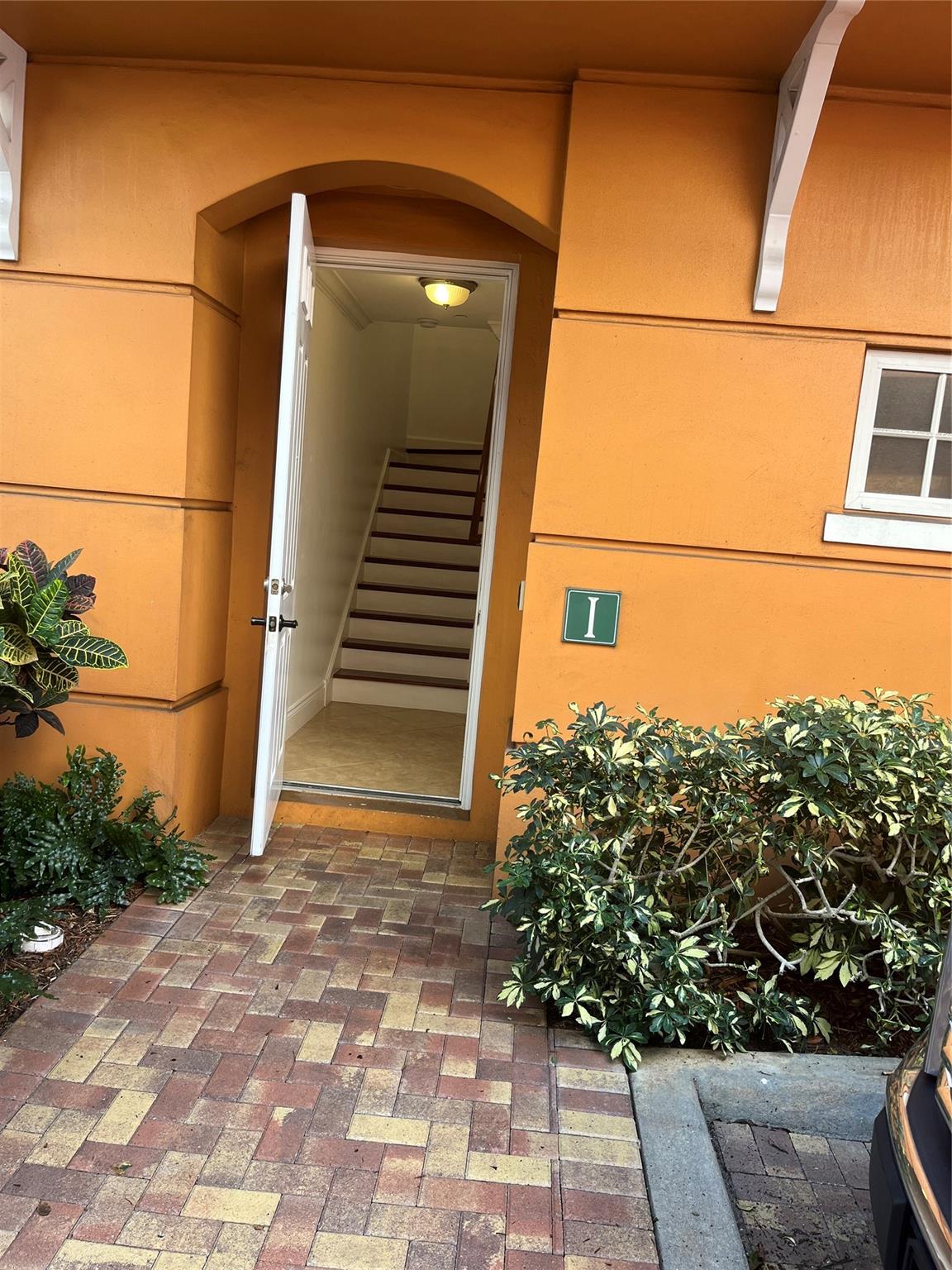 Great New Price! LOCATION SAYS IT ALL! - Experience the luxury of living your vacation dream every day. WALK TO: Beach, Publix, dining & shopping. Call this 3 level townhouse in the heart of Delray Beach HOME & spend your free time @ the trendy boutiques , Coffee houses , shops and restaurants along the Avenue. Stainless steel appliances, beautiful kitchen with custom cabinetry and endless storage. Towering high ceilings, lots of windows, light & bright, 3 bedrooms, 3 baths. Balcony off Master Suite - Brand new Berber flooring in 2nd & 3rd Bedroom, freshly painted, 2 car garage, Central Vacuum, utility tub - Washer Dryer, Hurricane impact windows & quality doors throughout. Heated swimming pool! Park your car in your garage & leave the traffic behind! Pets up to 30 lbs. WELCOME HOME!
