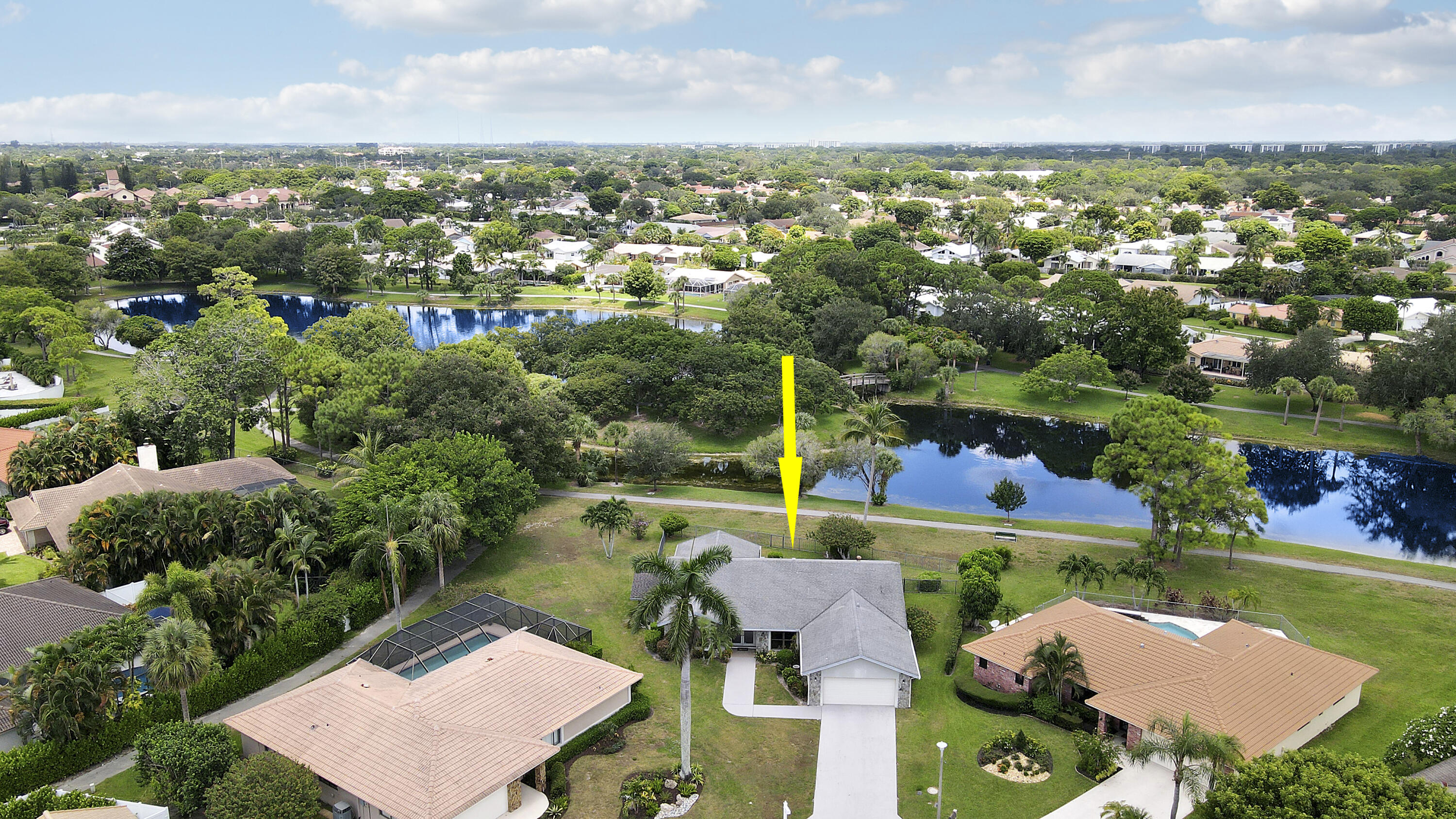 Lakefront pool home featuring 4 bedrooms, 2.5 baths, and an oversized lot (over 1/4 acre) perfectly situated at the end of a quiet cul-de-sac. Located in an A-rated school district with a low HOA, this home is within walking distance to the YMCA and places of worship. Enjoy serene lake views from your covered back patio and a spacious backyard. Just beyond your backyard, a scenic walking path circles the large lake, lined with mature trees and lush landscaping. All in an unbeatable location close to Town Center Mall and some of Boca Raton's finest restaurants and shops.