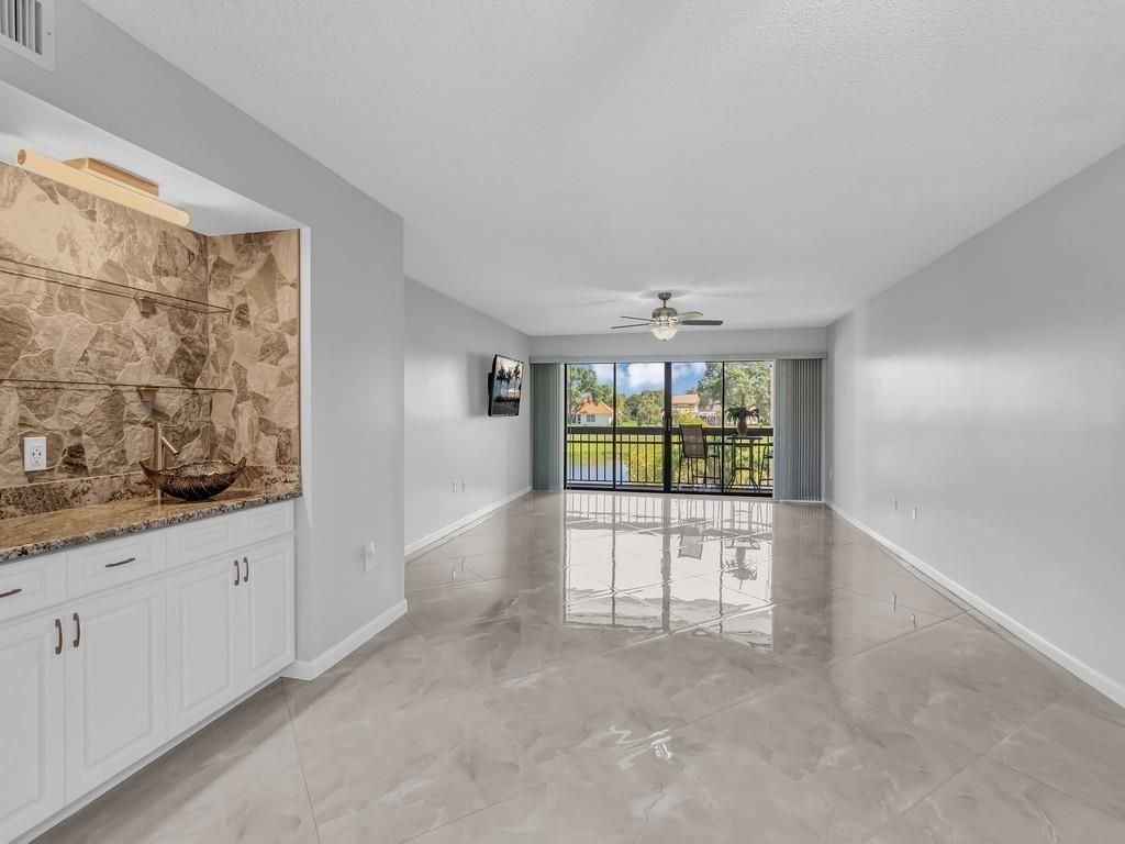 Photo of 3200 Twin Lakes Terrace #202, Fort Pierce, FL 34951 (MLS # R10950708)