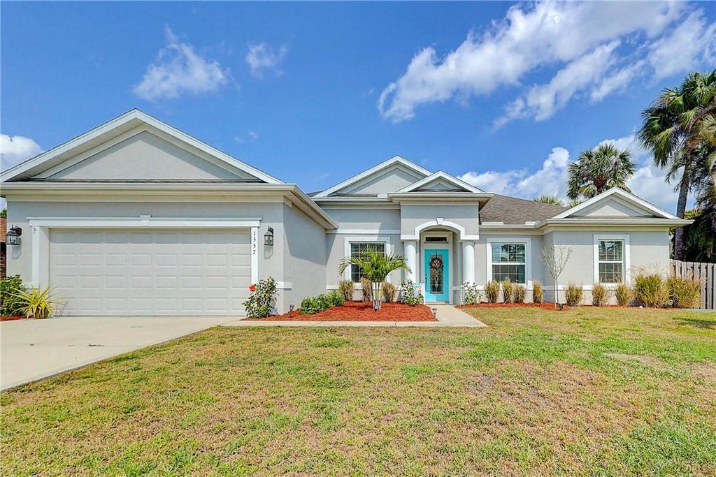 Photo of 1557 SW Urbino Ave, Port Saint Lucie, FL 34953 (MLS # F10368606)