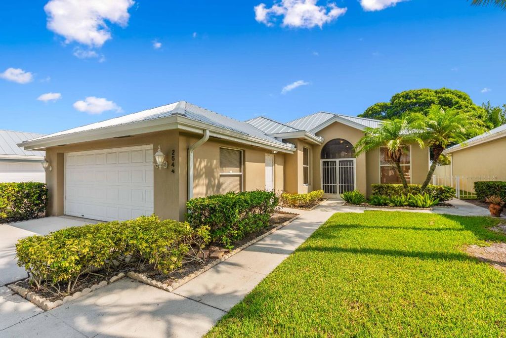 Photo of 2544 SW Greenwich Way, Palm City, FL 34990 (MLS # R10985038)