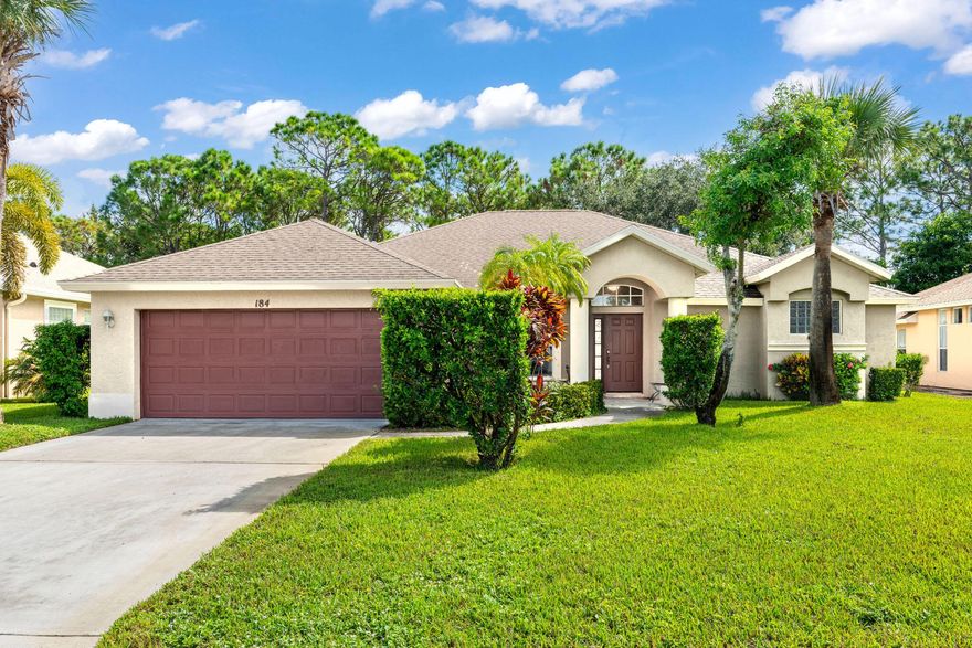 This inviting home is located in a gated community in the heart of Port Saint Lucie. Just one row back from the lake, this property offers plenty of natural light with large windows throughout. The kitchen is equipped with stainless steel appliances, and the separate laundry room can also serve as extra storage. A big separate dining room adds to the home's functionality. The master suite features dual vanities, a stand-up shower, and a soaking tub. The spacious backyard with mature trees, a private patio, and a two-car garage completes the property. Conveniently located close to schools, Tradition Square, St. Lucie West shopping, dining, I-95, and the Turnpike.