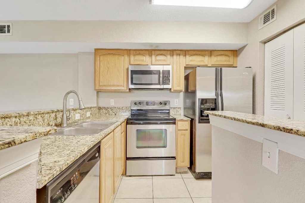 Photo of 271 SW Palm Drive #102, Port Saint Lucie, FL 34986 (MLS # R10946009)