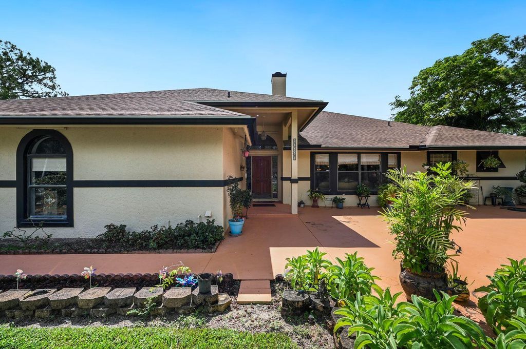 Photo of 12660 157th Street N, Jupiter, FL 33478 (MLS # R10924182)