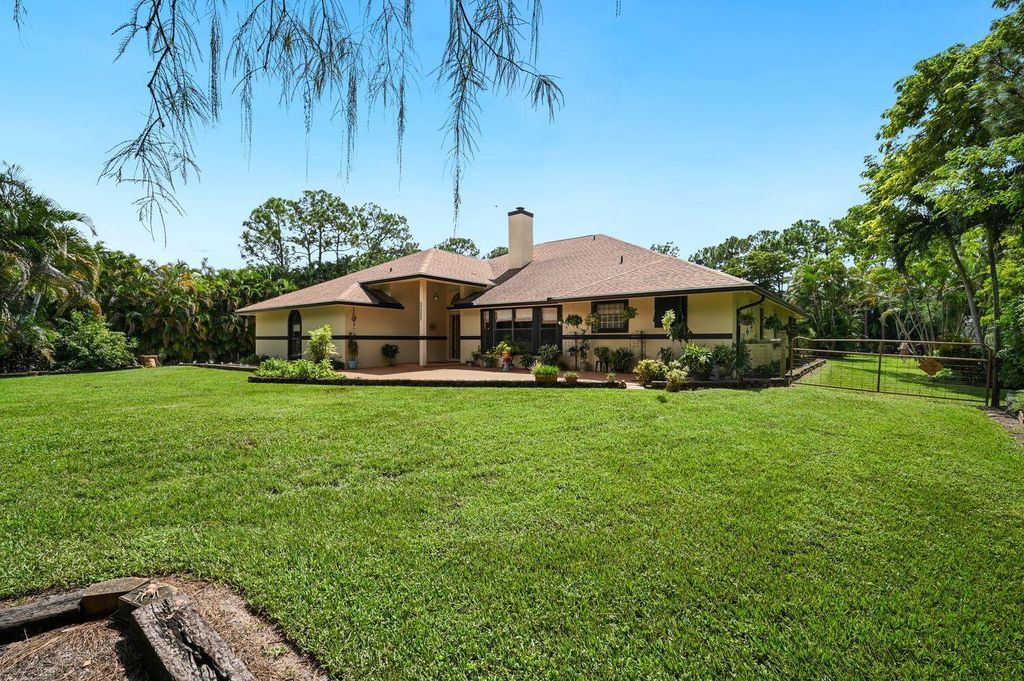 Photo of 12660 157th Street N, Jupiter, FL 33478 (MLS # R10924182)