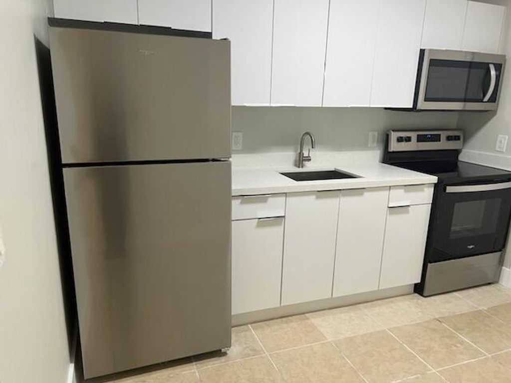 Photo of 1310 N 16th N Court #D, Fort Pierce, FL 34950 (MLS # R11023226)