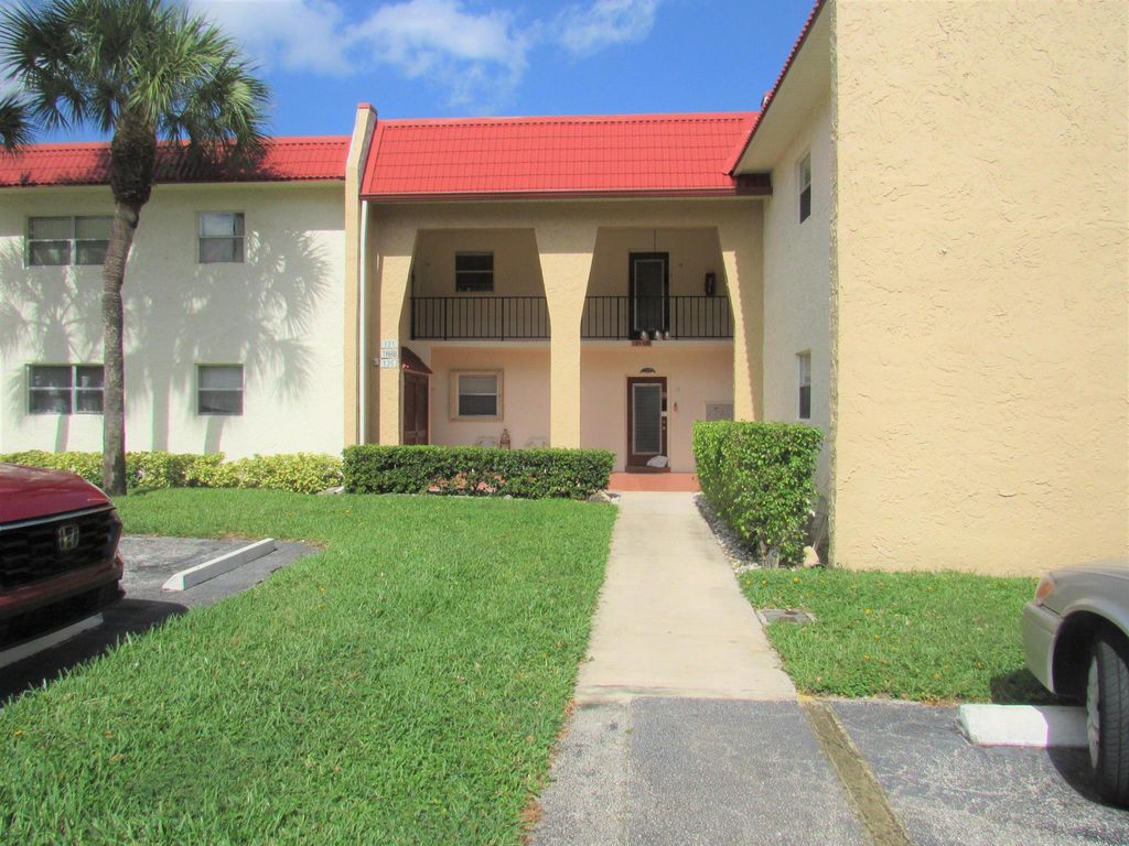 Photo of 121 Lake Carol Drive, West Palm Beach, FL 33411 (MLS # R10933580)