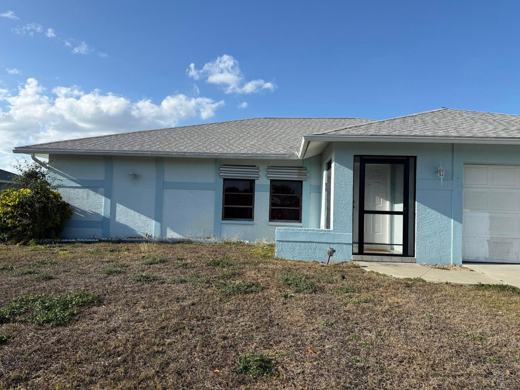 Photo of 319 SE 27th Street, Cape Coral, FL 33904 (MLS # B26014015)