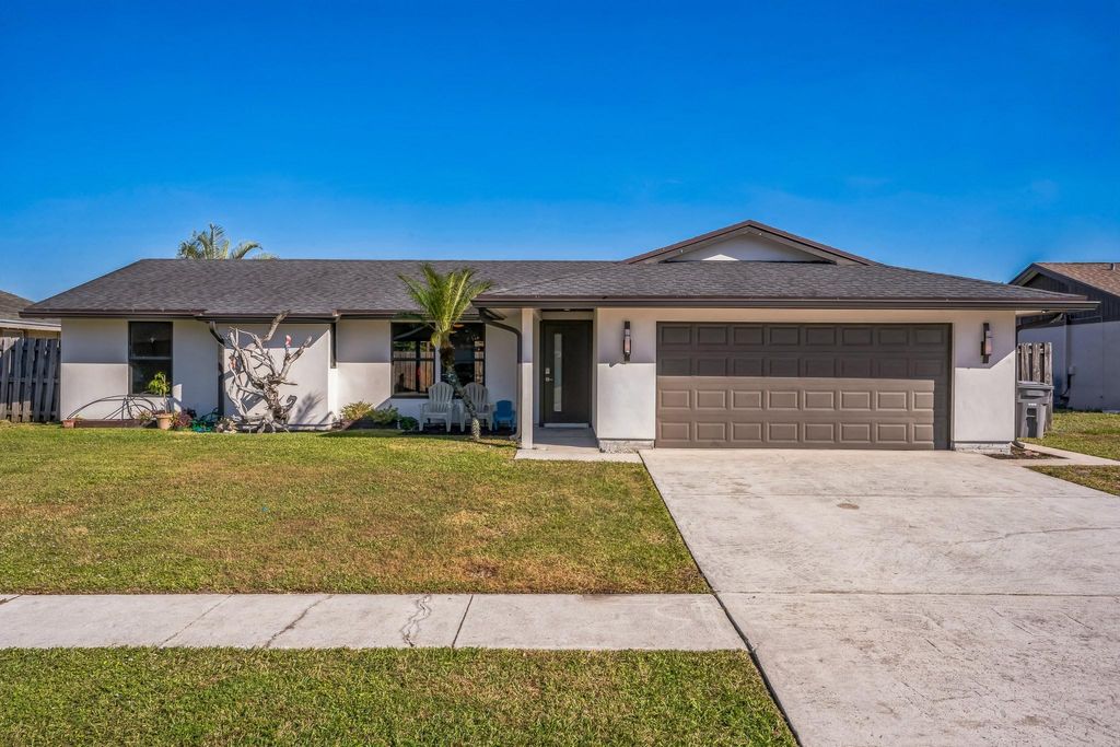 Photo of 8460 Raymond Dr, Boynton Beach, FL 33472 (MLS # F10531150)