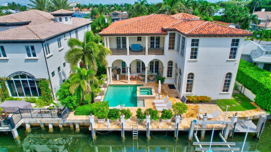 The best waterfront living just steps from the ocean in Delray Beach. This 5-bedroom, plus office beautifully appointed home has extensive indoor and outdoor living space.   Located on a deep water canal off the Intracoastal Waterway with 75 feet +/- with dock space with boat lift, the residence features high-impact glass throughout, gourmet kitchen, master suite, elevator and is lushly landscaped with private pool and spa. Located minutes away from Delray's Atlantic Avenue filled with art galleries, upscale shops, fine restaurants, nightly entertainment.