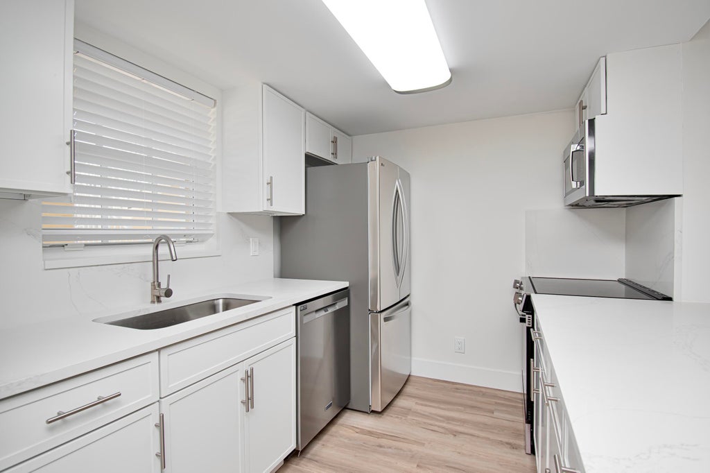 Photo of 6292 LA COSTA Drive #F, Boca Raton, FL 33433 (MLS # B26070424)