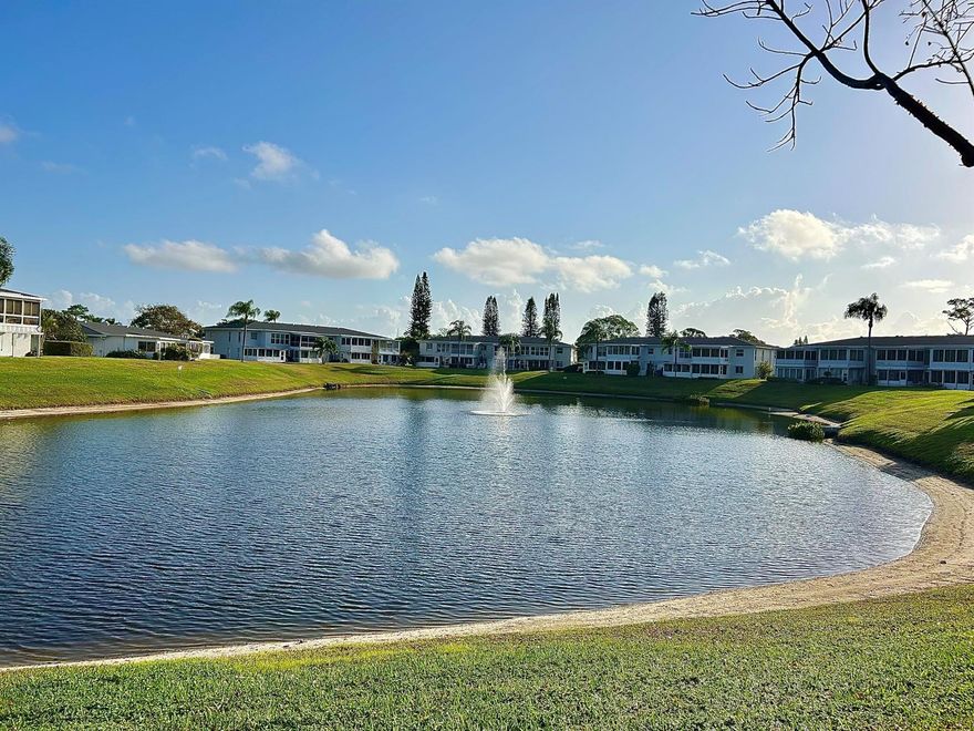 BEST LAKE VIEW IN COMMUNITY. LARGE ENCLOSED PATIO. Gorgeous condo, completely renovated in 2023 in desirable Delray Beach.New A/C installed in June 2025! Best Lake view in the community! Second floor 2 bedrooms - 2 full baths! 2 walk-in closets and linen closet in master bedroom.. NEW 2023 roof on the building. Both bedrooms have Fans! Easy to maintain NEW tile floors though out the entire home! NEW baseboards! - Upgraded Kitchen and bathroom cabinets * NEW granite counter tops * NEW mosaic backslash * NEW stainless steel double sink * New Faucets * Stainless Steel appliances... Front load washer and dryer *** The kitchen is open to the living rom *** Super clean and move-in ready!