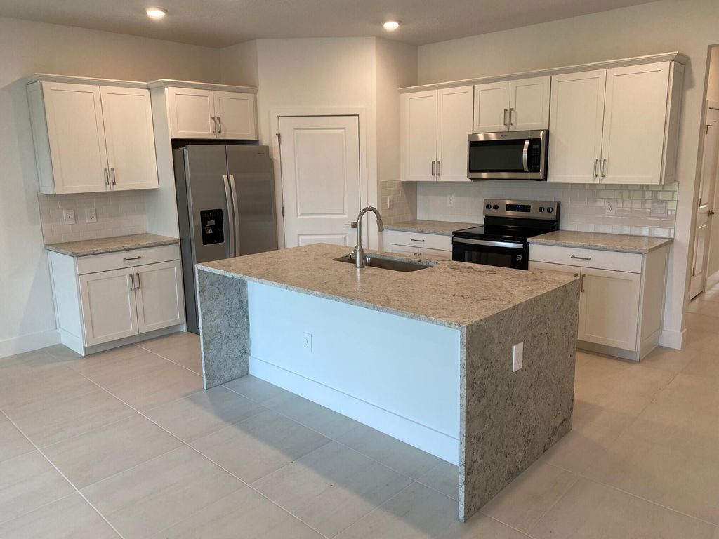 Photo of 6821 SE Park Trace Drive, Stuart, FL 34997 (MLS # R11060970)