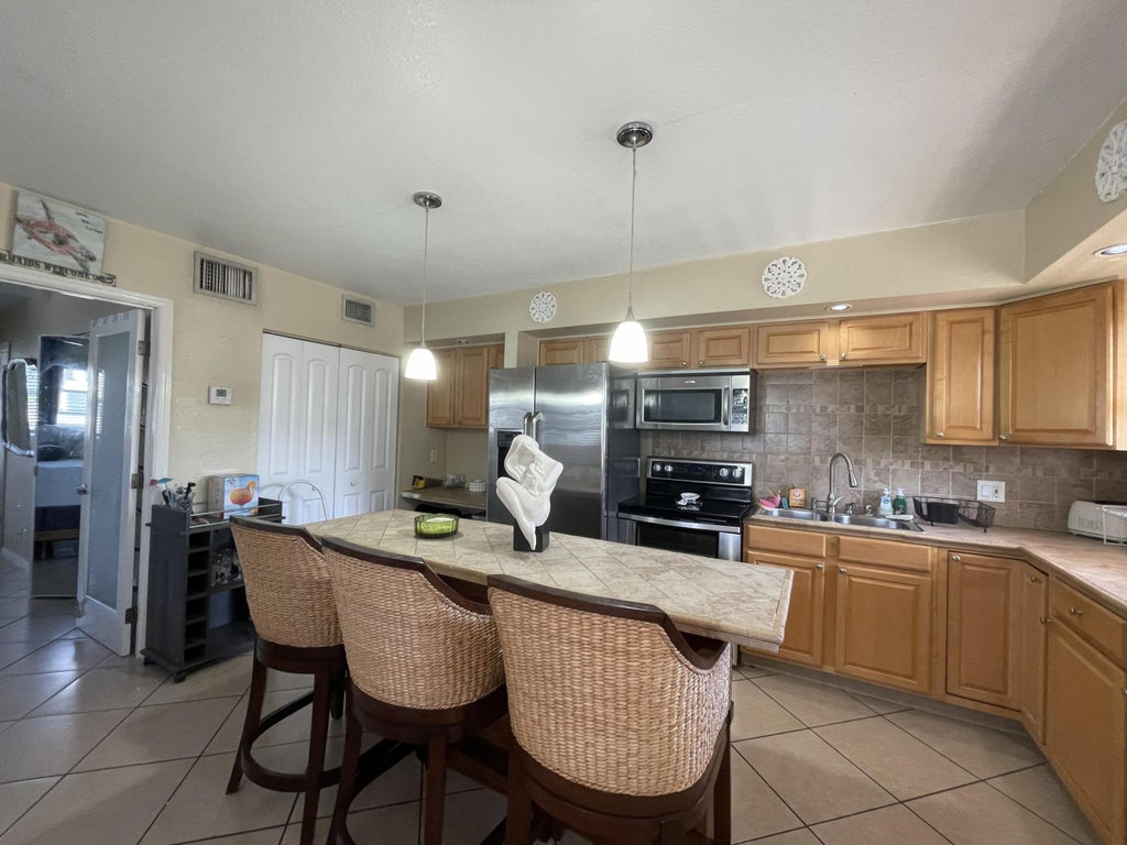 Photo of 229 SE 1st Avenue #203, Boynton Beach, FL 33435 (MLS # B26044786)