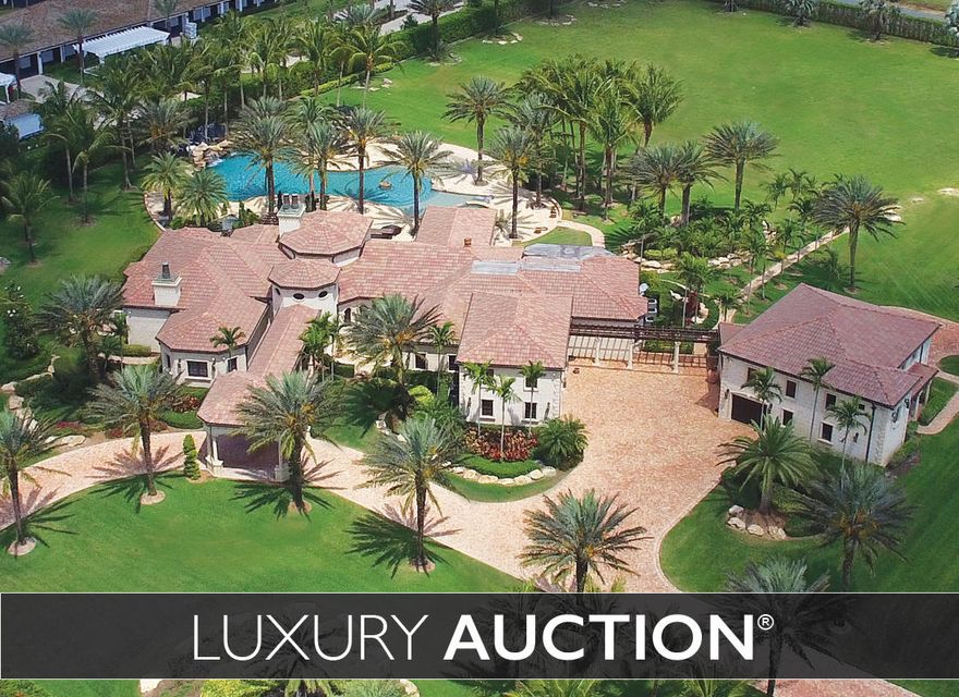 This Equestrian Oasis in Wellington Preserve will be sold at Luxury AUCTION(r) on May 19th, 2018 in cooperation with Platinum Luxury Auctions! Now selling subject to creditor confirmation! List price used here is FOR REFERENCE ONLY. Inquire for complete auction details.Private resort home with all the finest amenities and details, including state of the art A/C, electric, billiards room, and 2nd floor gym. For her, relax by the extravagant outdoor oasis pool and for him, collect all the cars and toys your heart desires, while working on them in your own fully built-out garage complete with car lift and modern loft. For the kids, enjoy running around the immense yard with plenty of space to play followed up with an evening of unwinding in the movie theatre. The perfect home for absolutel