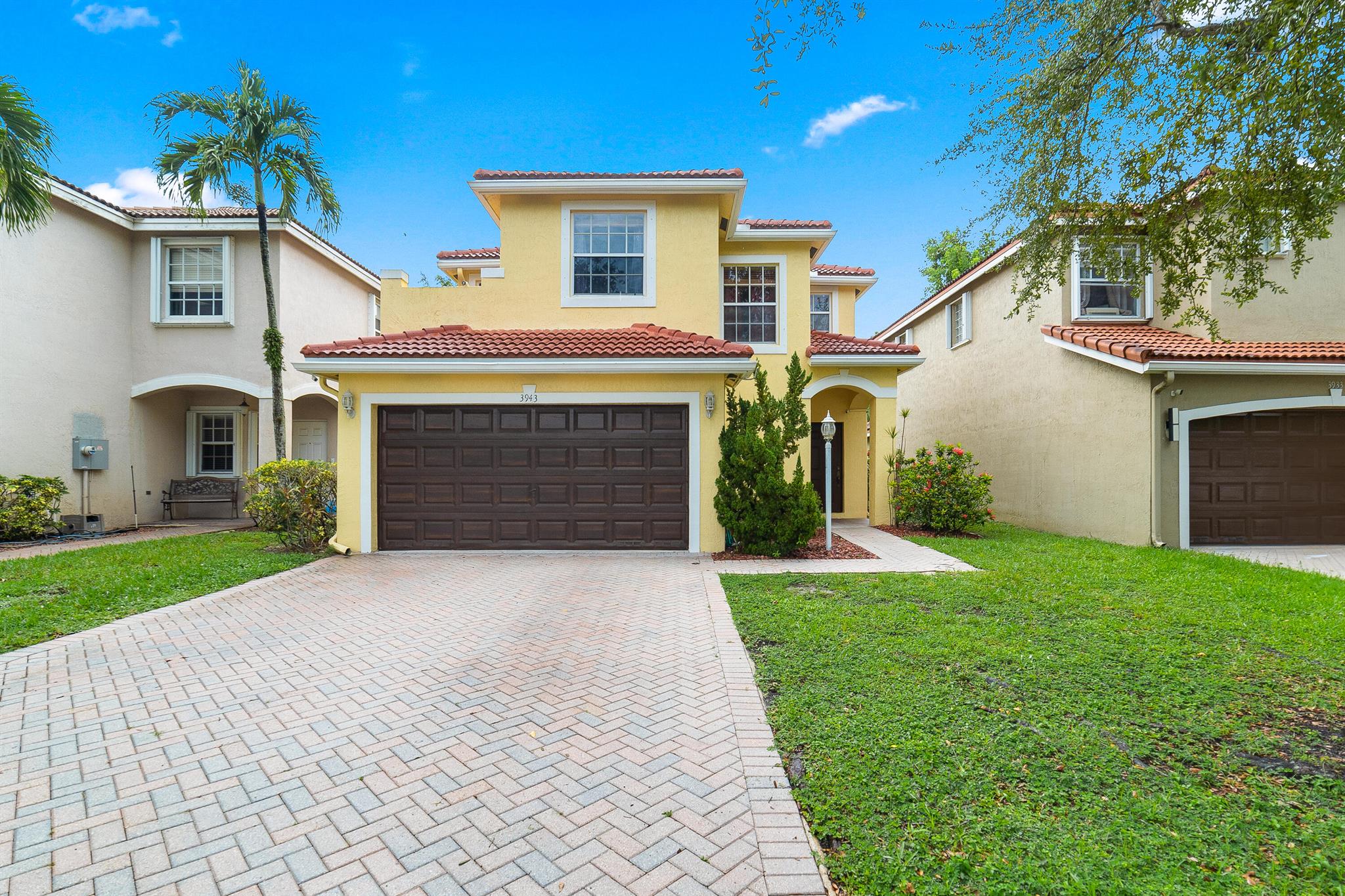 Welcome home to this immaculate 3 bedroom 2.5 bathroom property located in the highly sought after Crescent Creek community of Coconut Creek. New Roof 2019!  As soon as you enter, you immediately notice the abundant natural light and large open family room. Recently updated primary bath and half 2025.  The home features tile flooring throughout the first floor living areas and new laminate in all of the bedrooms. The kitchen has been partially updated with newer quartz countertops and new stainless steel appliances. The huge primary suite boasts high ceilings, tons of closet storage and partially updated primary bath. All secondary bedrooms are on the second floor as well with plenty of closet space and updated secondary bath. The backyard offers wonderful privacy for relaxing and