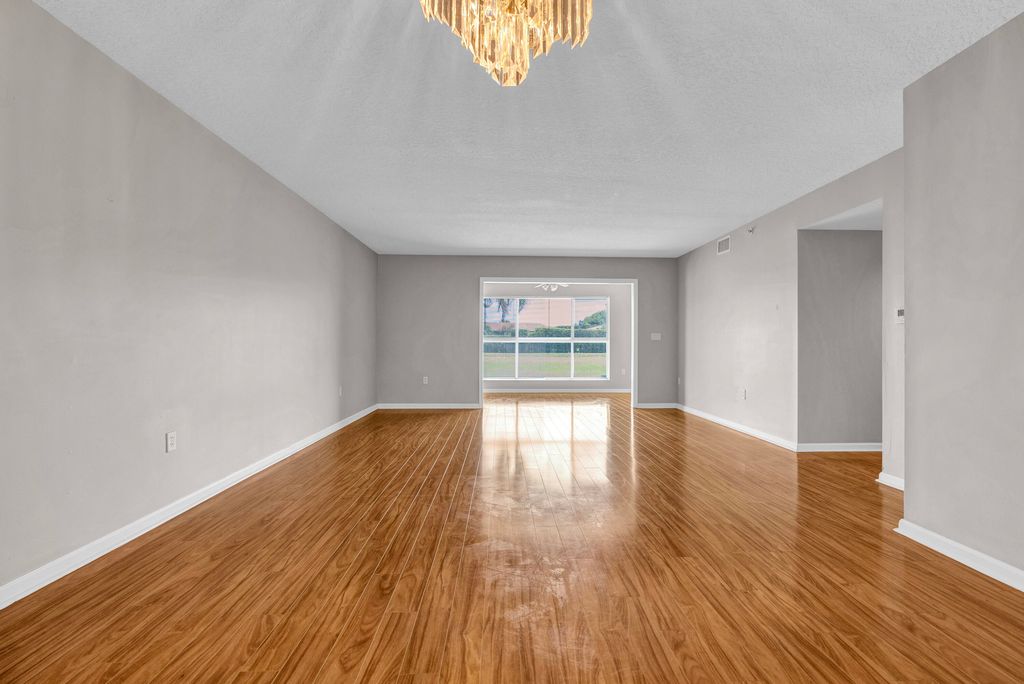 Photo of 5952 Regal Glen Drive #103, Boynton Beach, FL 33437 (MLS # B26030312)