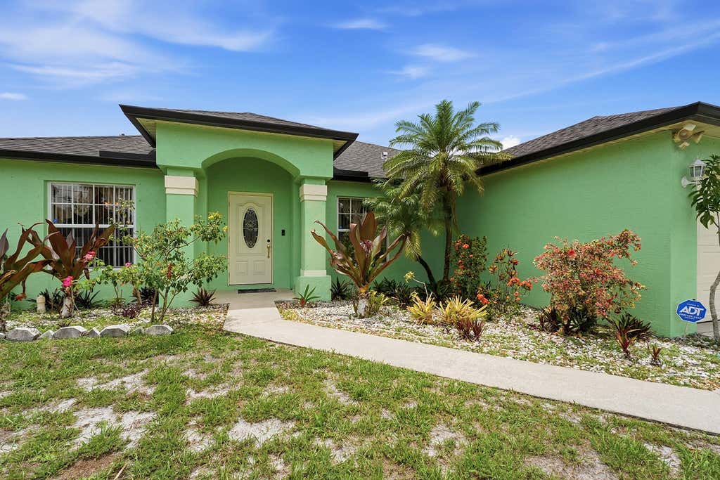 Photo of 1842 SW Penrose Avenue, Port Saint Lucie, FL 34953 (MLS # B26048198)