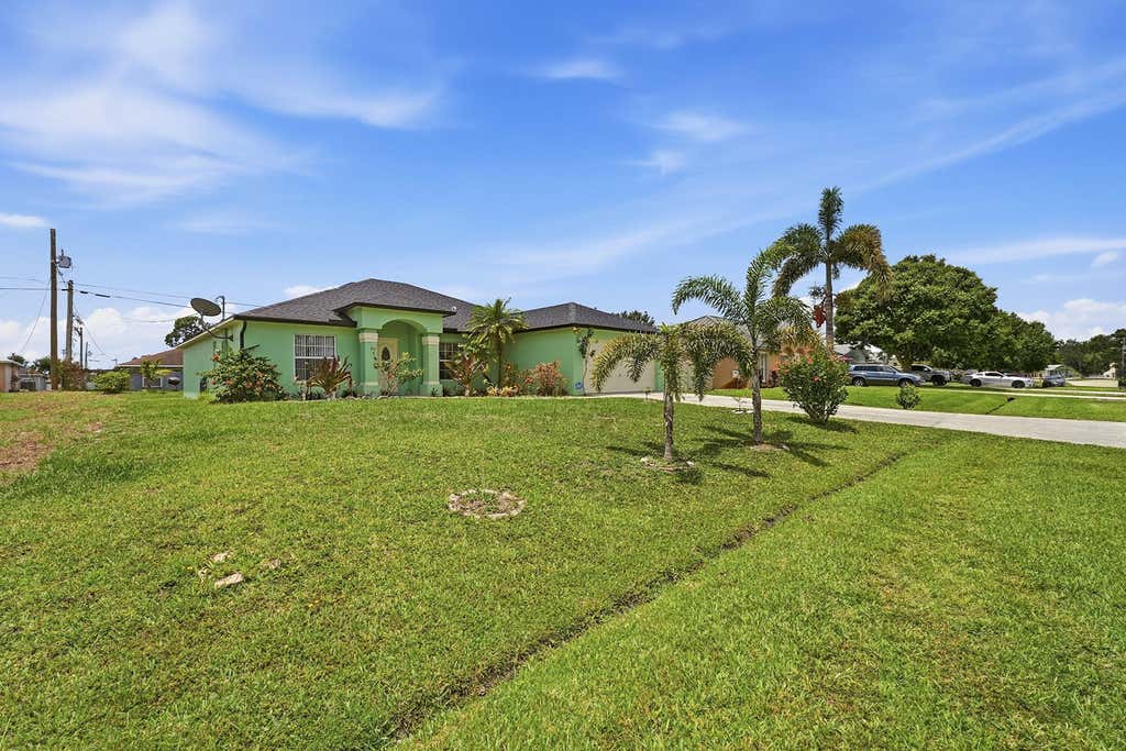 Photo of 1842 SW Penrose Avenue, Port Saint Lucie, FL 34953 (MLS # B26048198)
