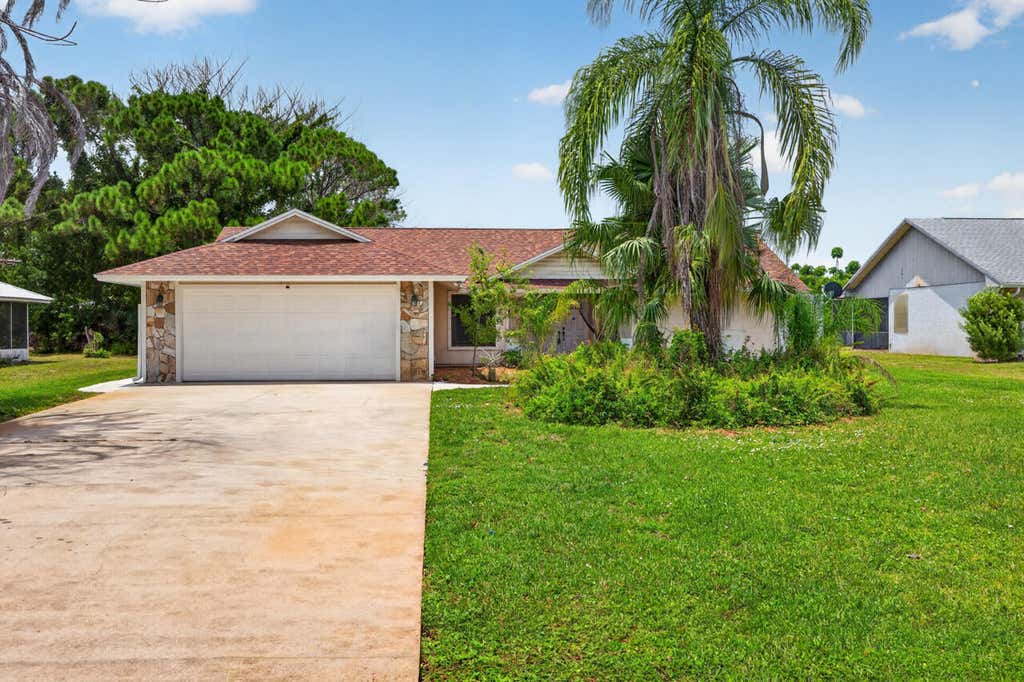 Photo of 5803 DEER RUN Drive, Fort Pierce, FL 34951 (MLS # B26058033)
