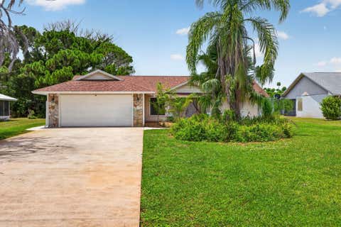 Photo of 5803 DEER RUN Drive, Fort Pierce, FL 34951 (MLS # B26058033)