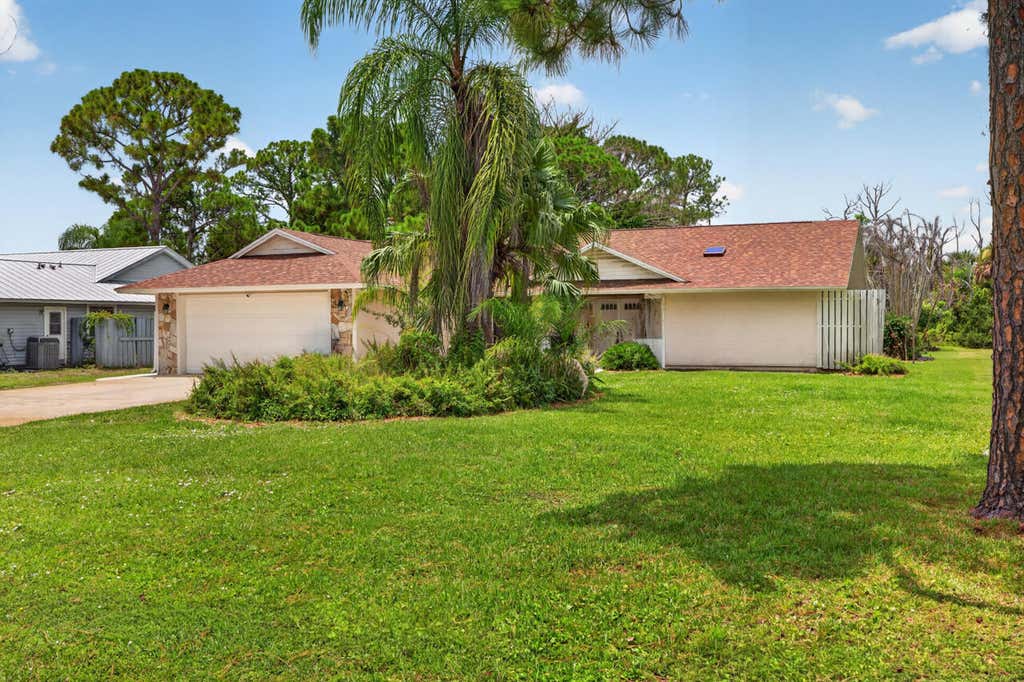 Photo of 5803 DEER RUN Drive, Fort Pierce, FL 34951 (MLS # B26058033)