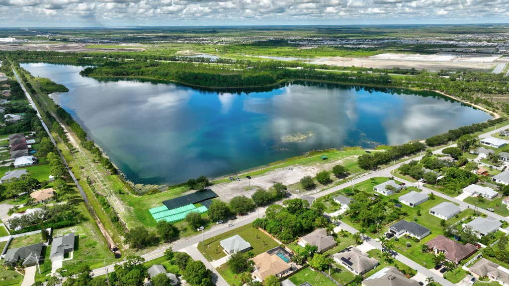 Photo of 3198 SW Crenshaw Street, Port Saint Lucie, FL 34953 (MLS # R10995298)