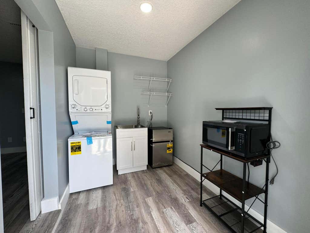 Photo of 702 NE Lanfair Street, Port Saint Lucie, FL 34983 (MLS # B26042743)