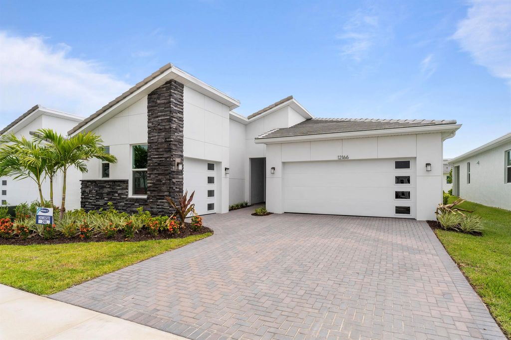 Photo of 12166 SW Viridian Boulevard, Port Saint Lucie, FL 34987 (MLS # R10889098)
