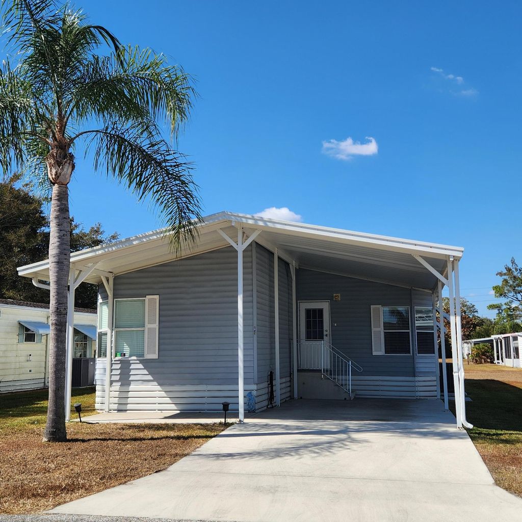 Photo of 14 La Costa Lane, Port Saint Lucie, FL 34952 (MLS # R11162809)