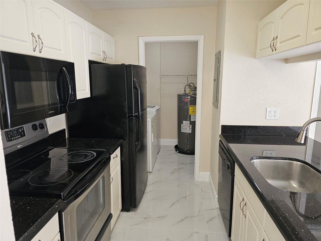 Photo of 2766 N Nob Hill Road #2766, Sunrise, FL 33322 (MLS # F10424494)