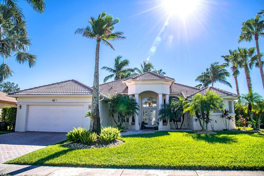 Minutes from the turnpike & 441, this meticulously updated home feels like a Mediterranean resort with serene lake frontage.  Fabulous layout in the desired neighborhood of Cypress Estates.  Light-filled 2760 SqFt home features open kitchen & breakfast area. Relax & watch the sunrise and enjoy gorgeous sunsets from family room, kitchen, or sitting room.  Opulent master suite includes elegant shower & walk-in closet.  Additional private entry suite: living/bedroom design w/plantation shutters and bathroom.   This beautifully-designed home includes formal dining, office, 3rd bedroom, 3rd bathroom, spacious 2 car garage and approved shutters for all windows. Lush, mature trees allow you to take it all in from a hammock.  Walk in the front door & be captivated by this home's beauty & light.