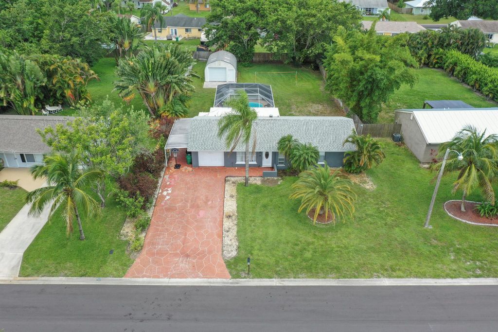 Photo of 2031 SE New York Street, Port St Lucie, FL 34952 (MLS # R10900369)