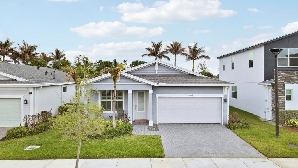 Photo of 11909 SW Lyra Drive, Port Saint Lucie, FL 34987 (MLS # B26008404)